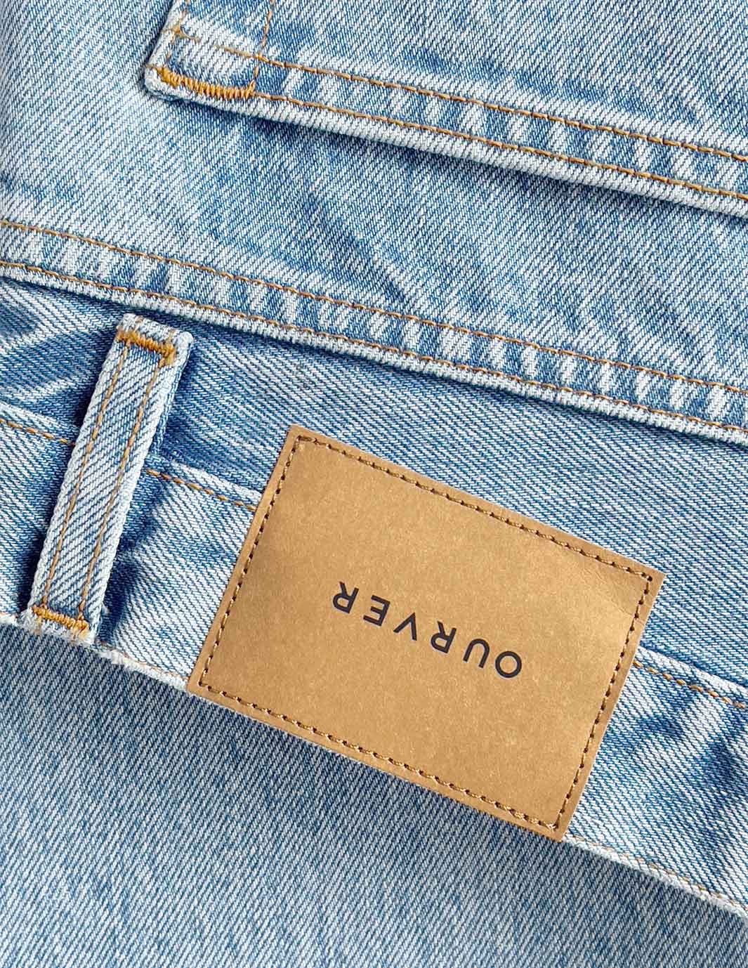 organic stonewash denim jeans with natural jacron ourver badge